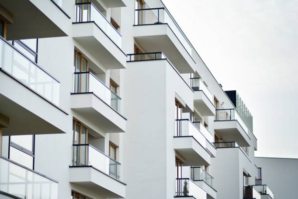 istock Modern apartment buildings on a sunny day with a blue sky. 1128502585