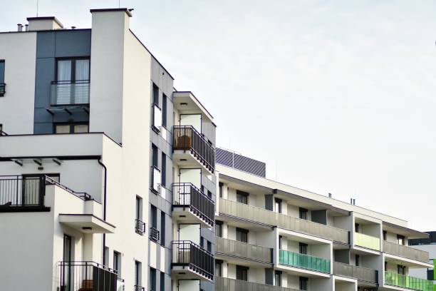 istock Modern apartment buildings on a sunny day with a blue sky. 1128505280