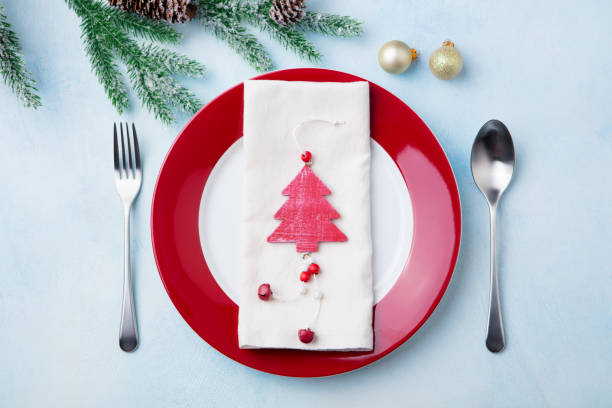 istock Christmas, New Year celebration place table setting. Copy space. Top view. 1128505908