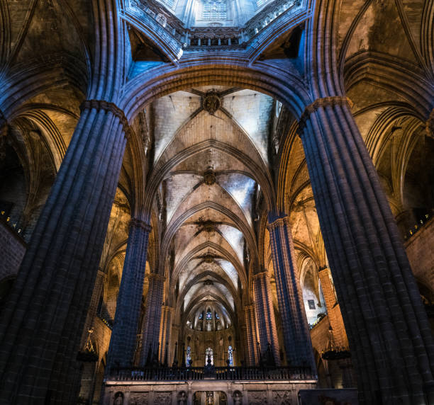 istock Columns and arches inside Barcelona gothic Cathedral 1128506451