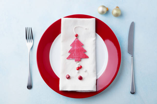 istock Christmas, New Year celebration place table setting. Copy space. Top view. 1128508898