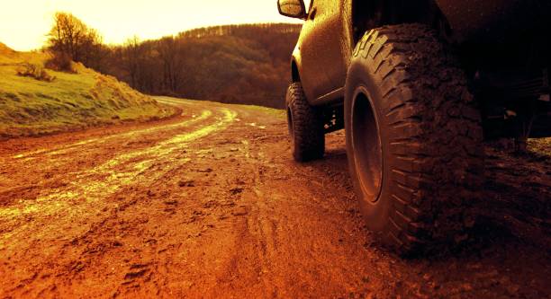 istock Off-road travel on mountain road 1128509645