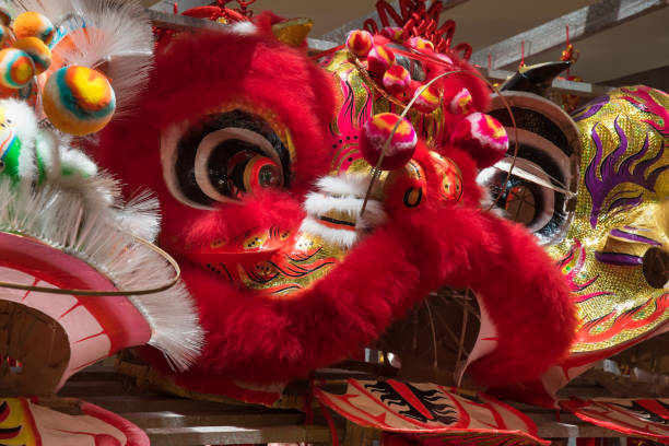istock Traditional Chinese lion dance heads on display 1128510512