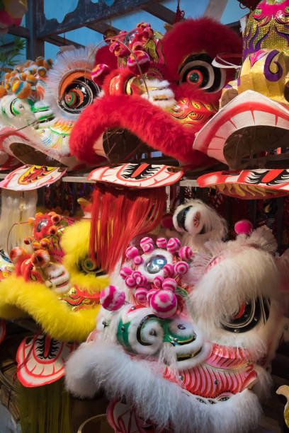 istock Traditional Chinese lion dance heads on display 1128510578