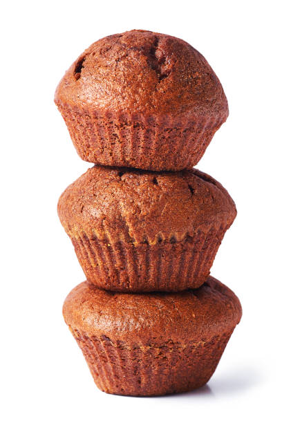 istock A few dark chocolate dough muffin on isolated on white background. 1128512530