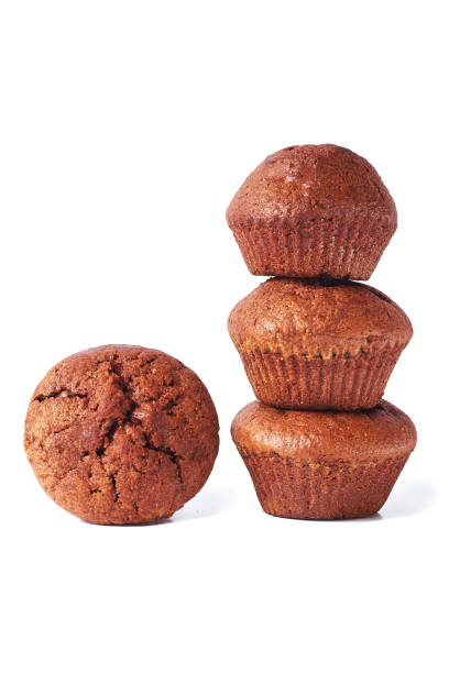 istock A few dark chocolate dough muffin on isolated on white background. 1128512553