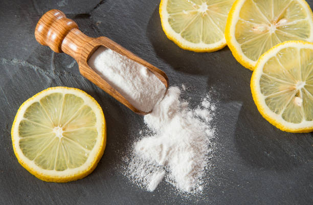 istock Lemon and baking soda on wooden table 1128512697