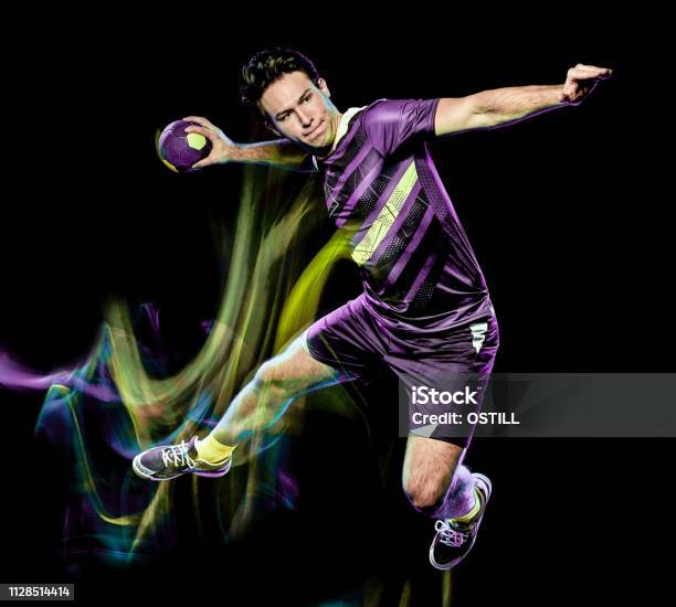 Handball Player Young Man Isolated Speed Light Painting - Fotografias de stock e mais imagens de Court Handball