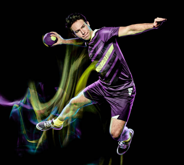 handbolls spelare ung man isolerade hastighet ljus målning - handball bildbanksfoton och bilder