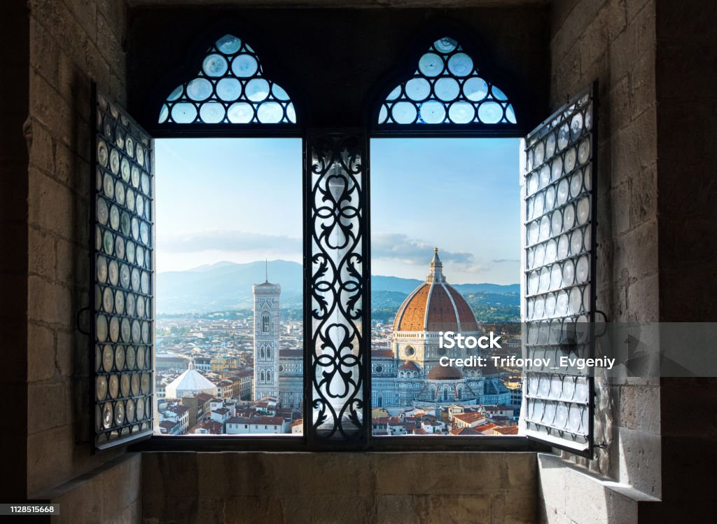 View from the old window on Florence Duomo Basilica di Santa Maria del Fiore.  Florence, Italy. Collage of the historical theme and the theme of travel. Florence - Italy Stock Photo