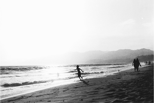 This series of images are taken at Santa Monica beach at sunset. \nBlack and white film\nCamera Pentax ME\nFilm Kodax 400