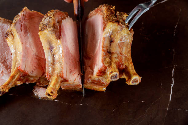 istock Grilled Steak on bone with knife and sliced grilled steak on bone pork 1128522997
