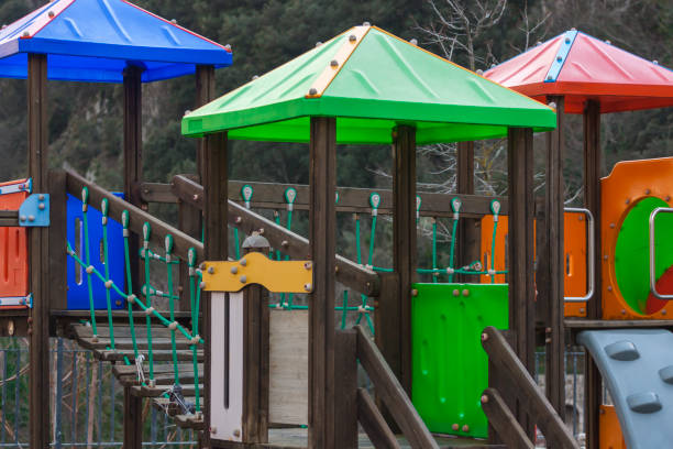istock Colorful playground on yard in the park 1128523661