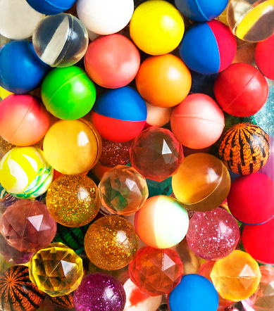 Color bright plastic and bouncy balls background