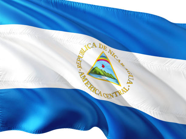 Flag of Nicaragua waving in the wind, isolated white background. 3D rendering fabric. Flag of Nicaragua waving in the wind, isolated white background. 3D rendering fabric. flag of nicaragua stock pictures, royalty-free photos & images