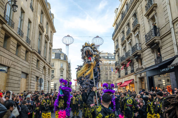 Paris, France; 05 February 2019: Celebration of the Chinese New Year in Paris. A group of Chinese residents performs a parade with dragons and typical dances to celebrate the arrival of a new year