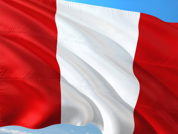 istock Flag of Peru waving in the wind against deep blue sky. High quality fabric. 1128527821