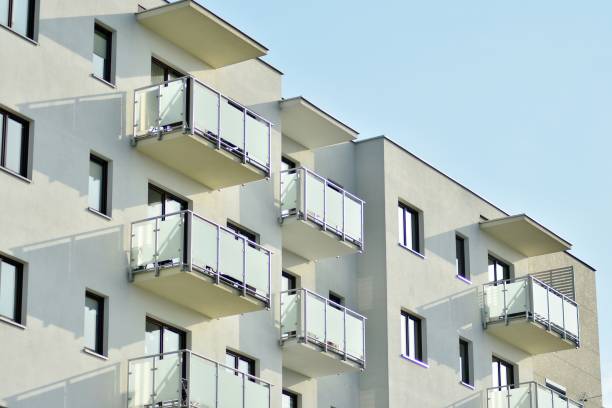 istock Modern apartment buildings on a sunny day with a blue sky. 1128530790