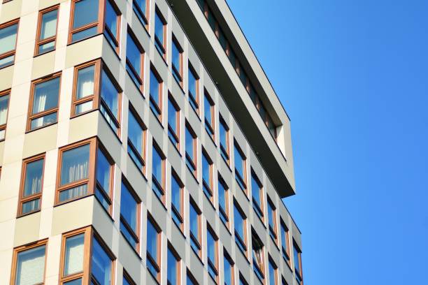 istock Modern apartment buildings on a sunny day with a blue sky. 1128532861