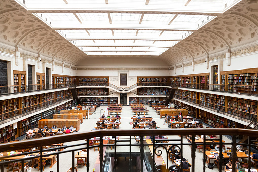 Sydney, Australia - October 01, 2017: State library of NSW with students and people studying and reading. The State Library of NSW is a large reference and research library open to the public. It is the oldest library in Australia.