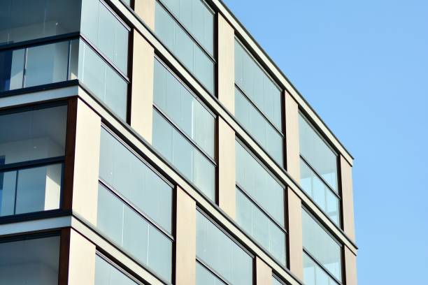 istock Modern apartment buildings on a sunny day with a blue sky. 1128536092