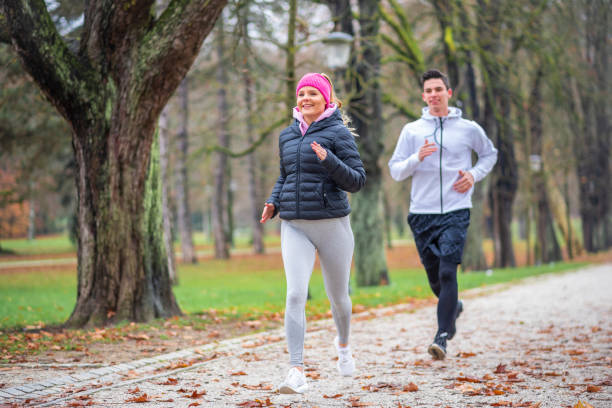 istock Two joggers running outdoors 1128539108