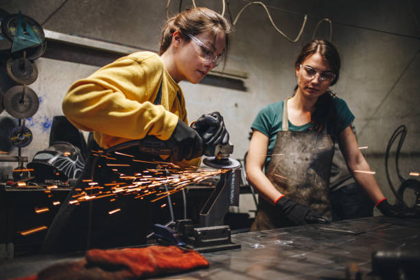istock Confident siblings working in a factory 1128544052