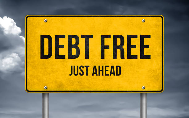 istock Debt Free - just ahead road sign 1128547629