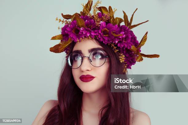 Beautiful Young Woman Wearing Floral Headband In Glasses Isolated On Light  Green Stock Photo - Download Image Now - iStock