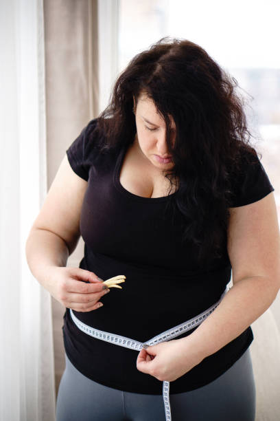 istock stress, compulsive overeating, fast food 1128553371