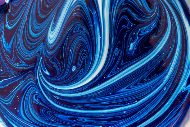 istock abstract drawing - mixing paint white and blue colors