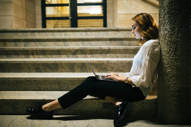 istock Hard working student studying in front of her school 1128554643
