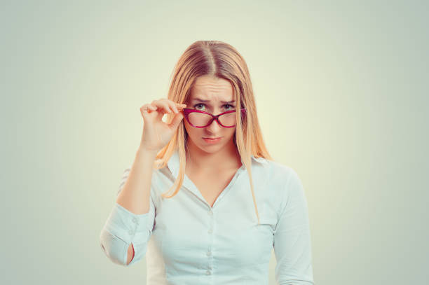 istock Skeptical woman looking at you 1128558672
