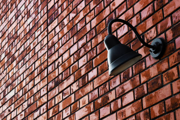istock Lighting fixtures installed on the brick wall 1128565379