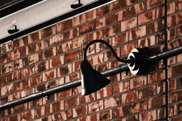 istock Lighting fixtures installed on the brick wall 1128565383