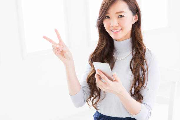 istock young attractive asian woman 1128568242