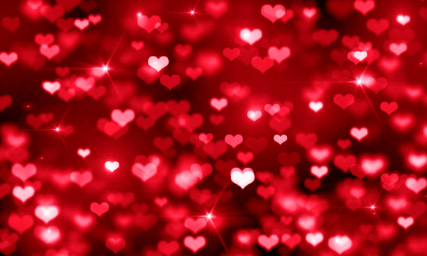 istock VALENTINE's day RED HEARTS ON a BLACK BACKGROUND,CELEBRATION,DESIGN,BRIGHT 1128571221