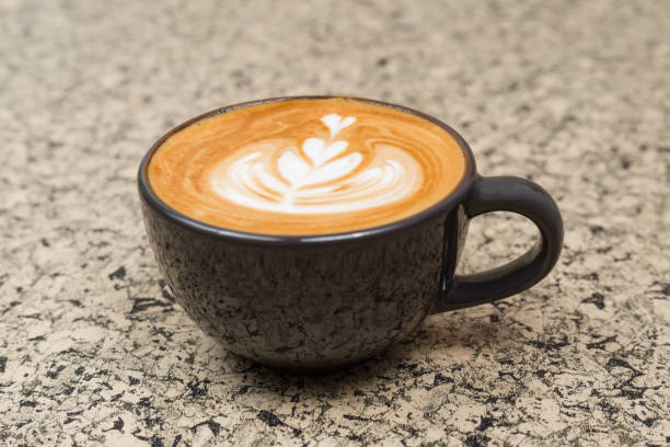istock Hot coffee cup. strong coffee on wooden table background. 1128572069