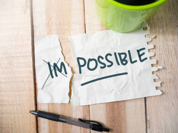 Impossible to Possible Impossible to Possible words letter. Motivational inspirational business typography quotes concept impossible possible stock pictures, royalty-free photos & images