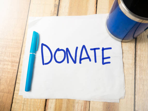 istock Donate, Motivational Business Charity Sharing Words Quotes Concept 1128574983