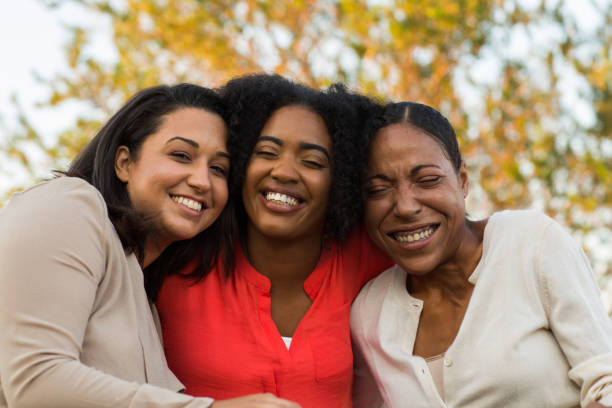 istock Multi-ethnic group of women laughing and talking. 1128584931