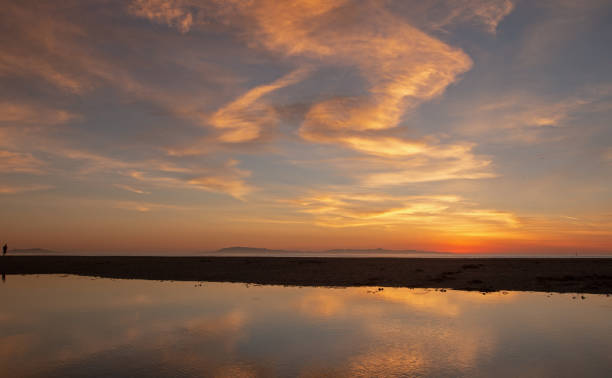istock Sunset cloud reflection over Santa Clara river seaside marsh at Ventura beach in California United States 1128590542