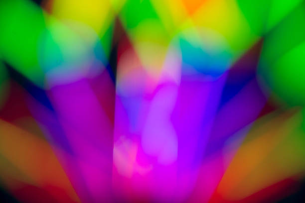 istock Abstract multi color of glow fluorescent on black background 1128593161