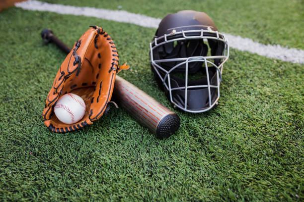 istock New Baseball in a Glove in the Outfield 1128609905