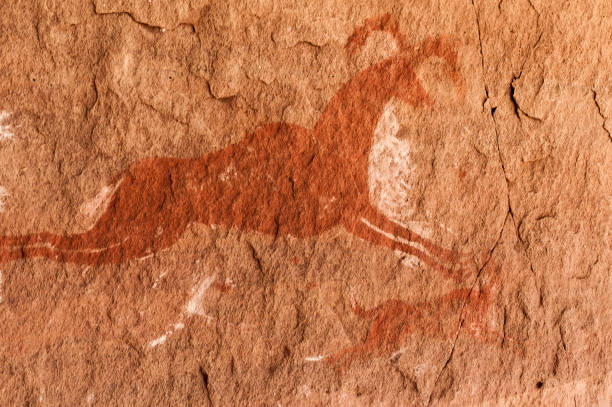 istock Prehistoric Petroglyphs in libian sahara desert 1128617750