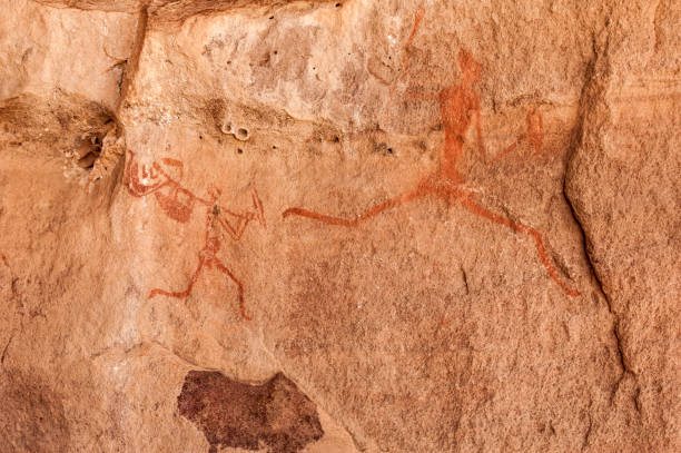 istock Prehistoric Petroglyphs in libian sahara desert 1128617762