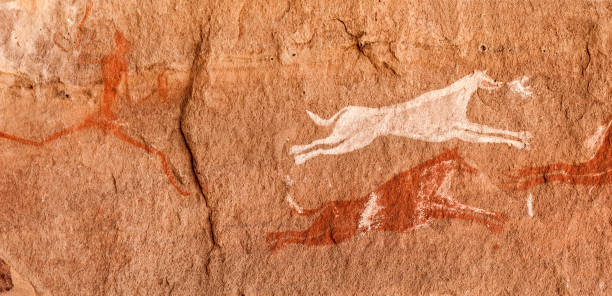 istock Prehistoric Petroglyphs in libian sahara desert 1128617775