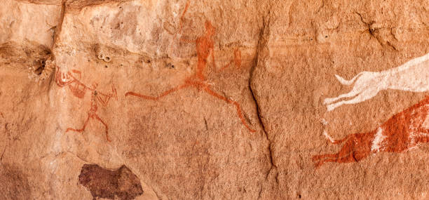 istock Prehistoric Petroglyphs in libian sahara desert 1128617776