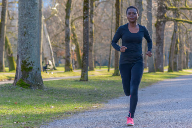 istock African woman jogging during her daily workout 1128619500