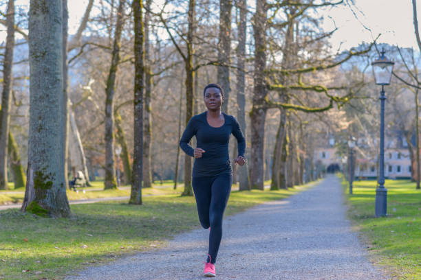 istock African woman jogging during her daily workout 1128620122